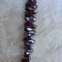 Courage and Hope Necklace with Hundreds of AAA Faceted Almandine Tear Drops, Unique Black Silk Tassel