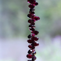 Courage and Hope Necklace with Hundreds of AAA Faceted Almandine Tear Drops, Unique Black Silk Tassel