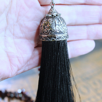 Courage and Hope Necklace with Hundreds of AAA Faceted Almandine Tear Drops, Unique Black Silk Tassel