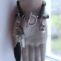 How to Fly Bracelet with Old Sterling Cuff, Sterling Cross, Raven Wing,Glass Quote Vessel & Sterling Capped Bead