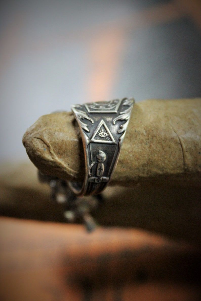 In this Sign Antique Sterling Masonic Wrap Ring w/Sterling Cross,Sterling Tassel,Antique Faceted Crystal Drop