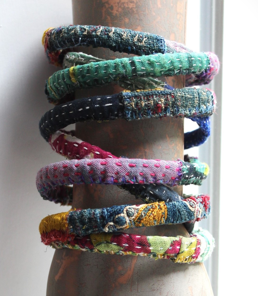 Infinite Possibilities Coiled Kantha & Embroidered Lambani Textile Bracelet with Dove of Peace Medal and Silk Tassel