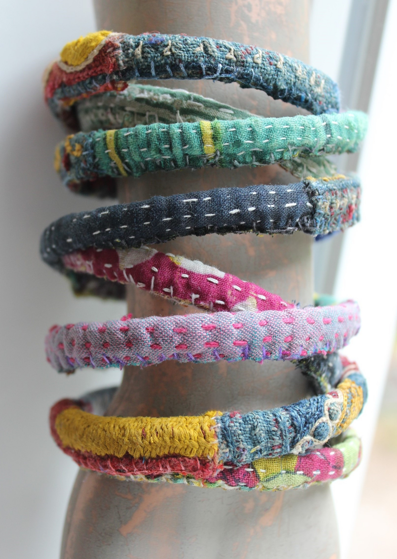 Infinite Possibilities Coiled Kantha & Embroidered Lambani Textile Bracelet with Dove of Peace Medal and Silk Tassel
