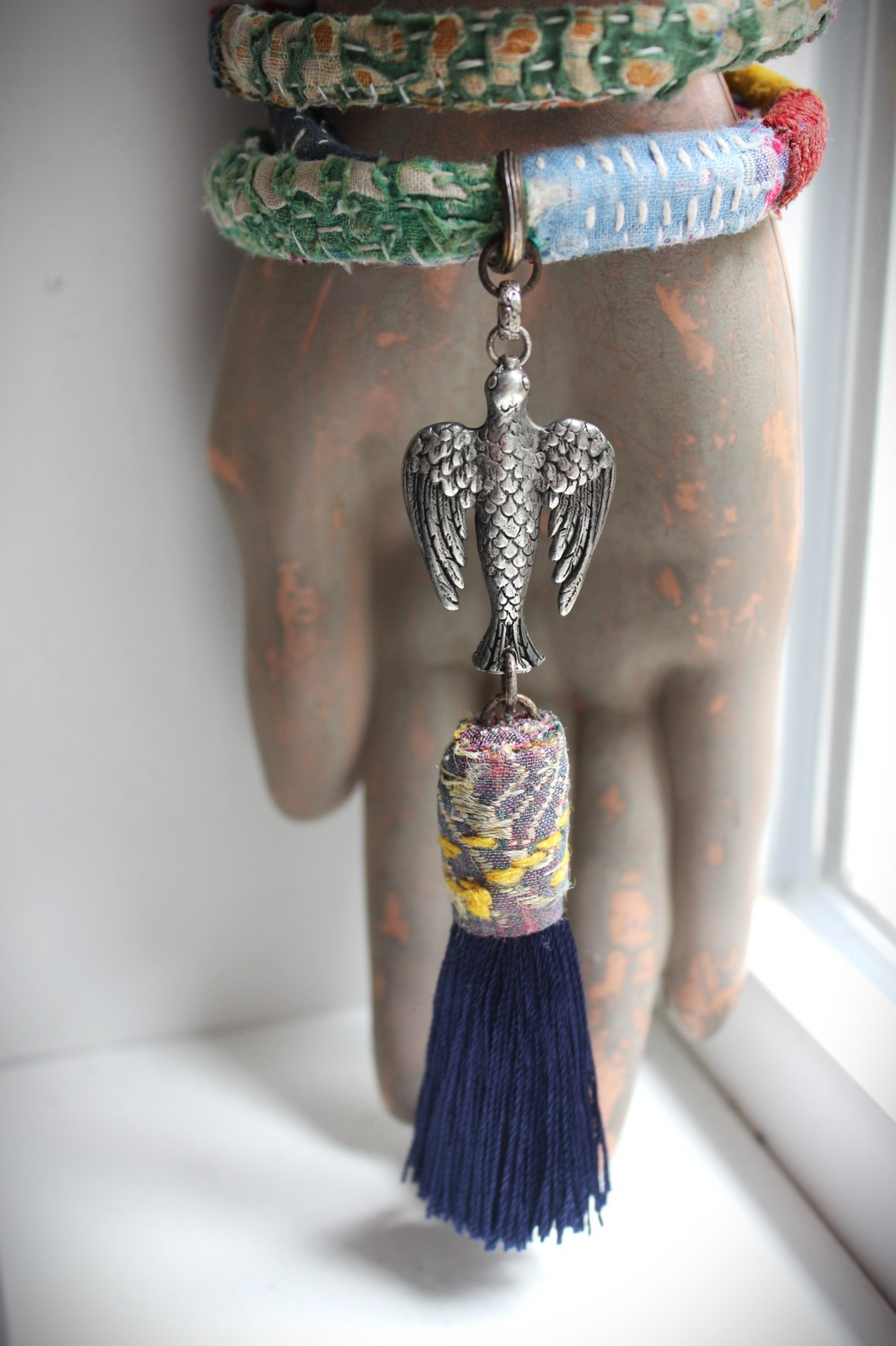 Infinite Possibilities Coiled Kantha & Embroidered Lambani Textile Bracelet with Dove of Peace Medal and Silk Tassel