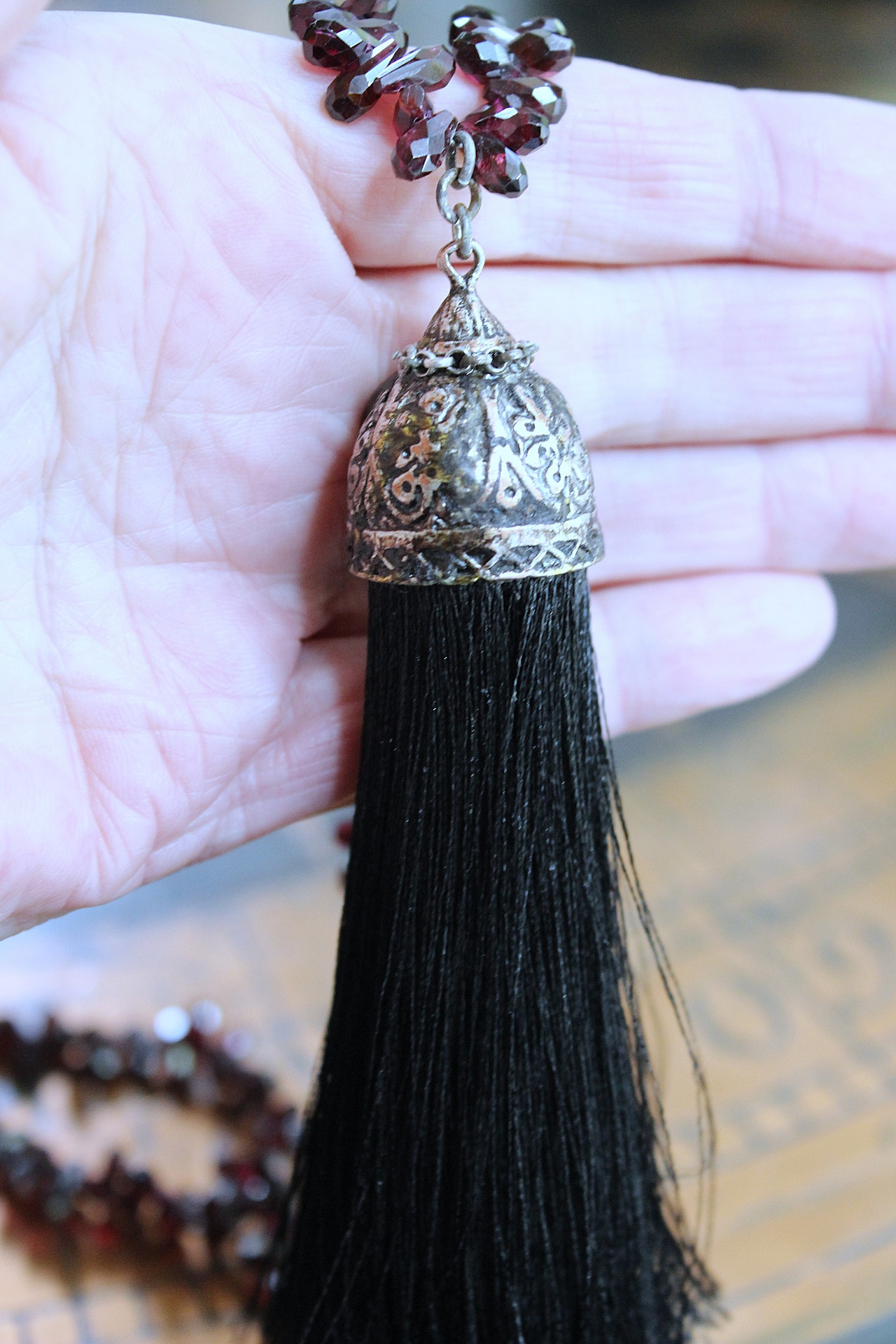 Courage and Hope Necklace with Hundreds of AAA Faceted Almandine Tear Drops, Unique Black Silk Tassel