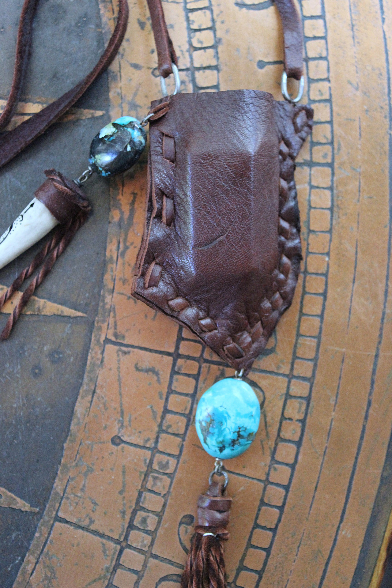 A Cage Necklace with Custom Leather Pouch, OOAK Double Terminated Clear Rock Quartz,Bisbee Turquoise and Leather Capped Elk Antler Tip