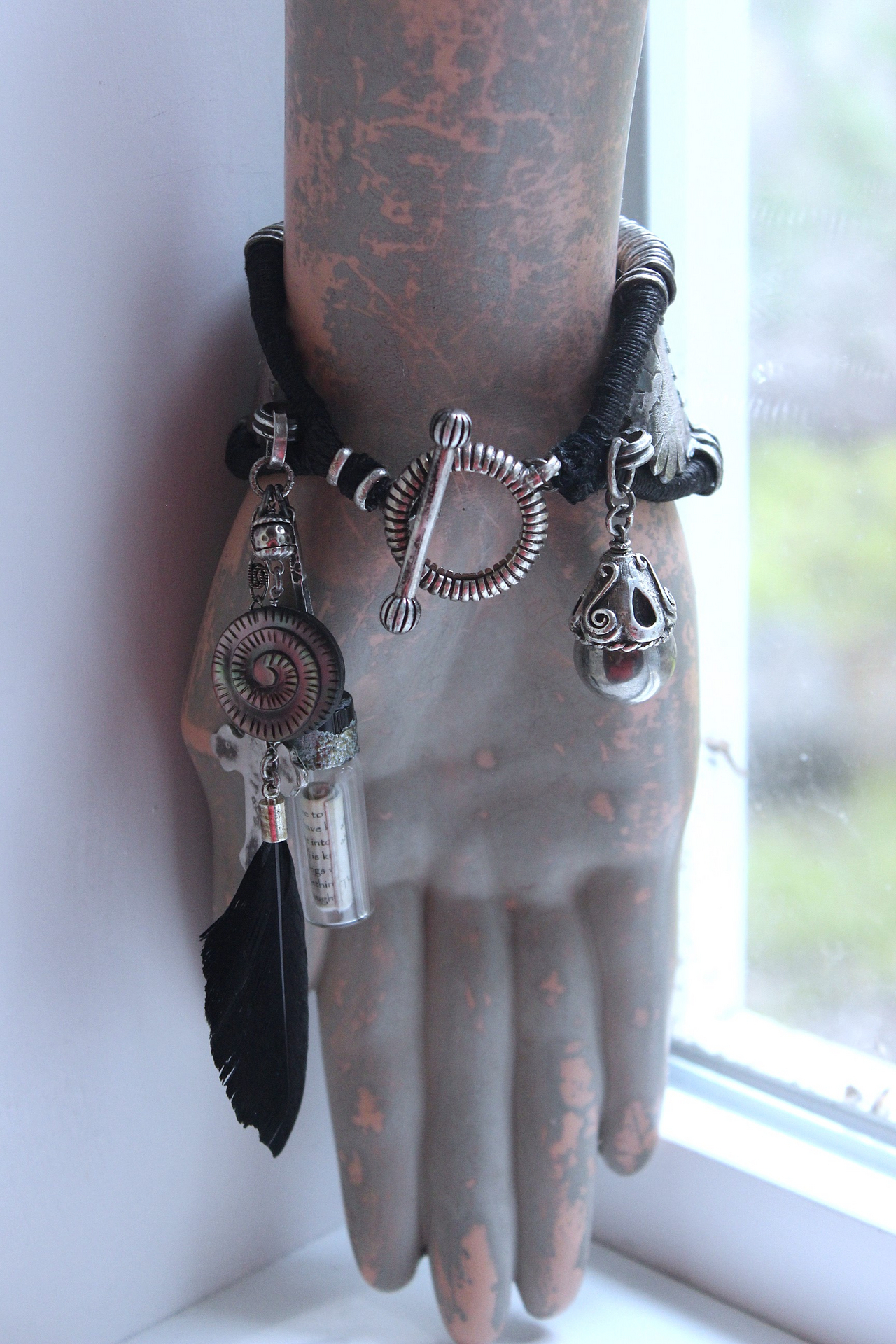 How to Fly Bracelet with Old Sterling Cuff, Sterling Cross, Raven Wing,Glass Quote Vessel & Sterling Capped Bead