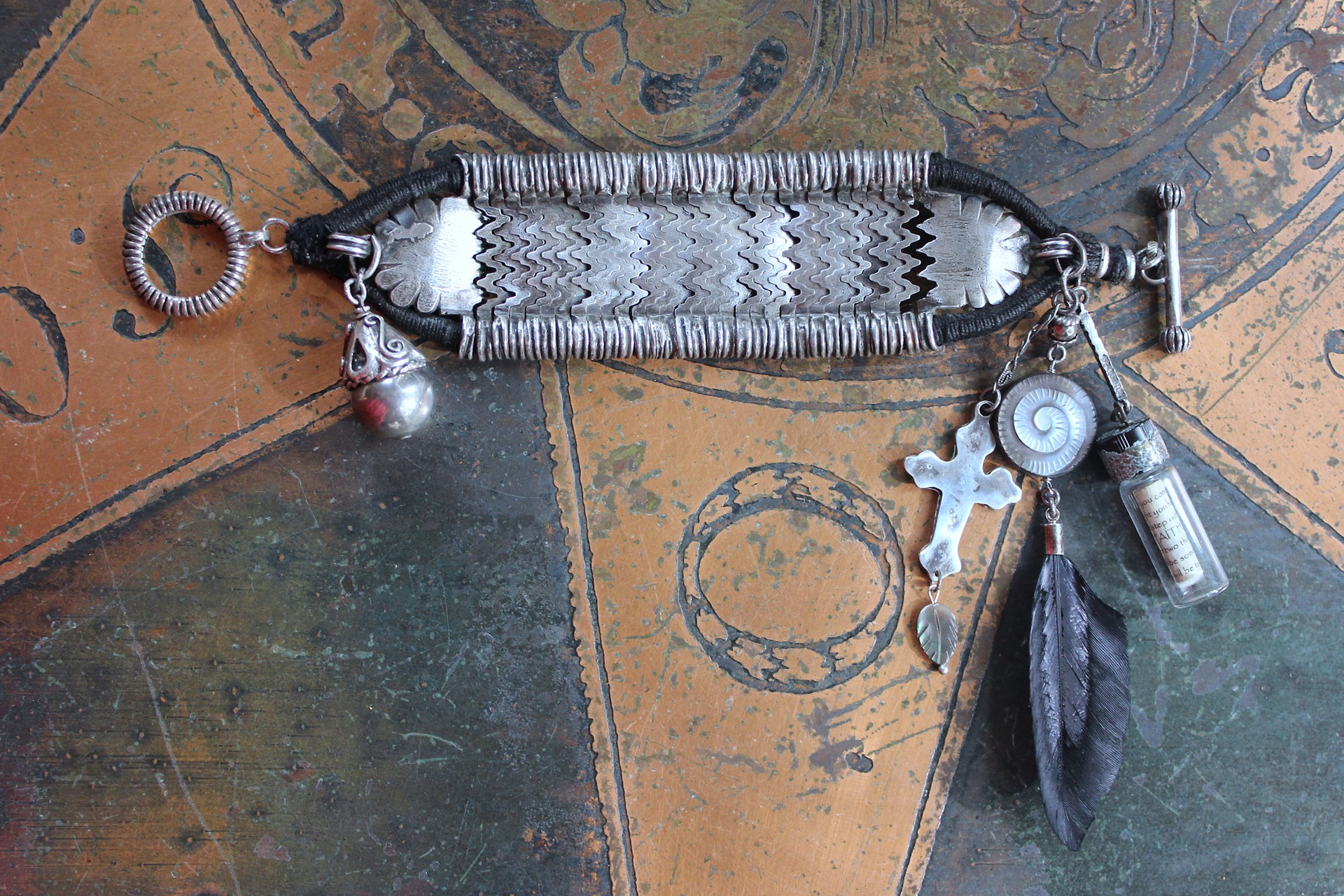 How to Fly Bracelet with Old Sterling Cuff, Sterling Cross, Raven Wing,Glass Quote Vessel & Sterling Capped Bead