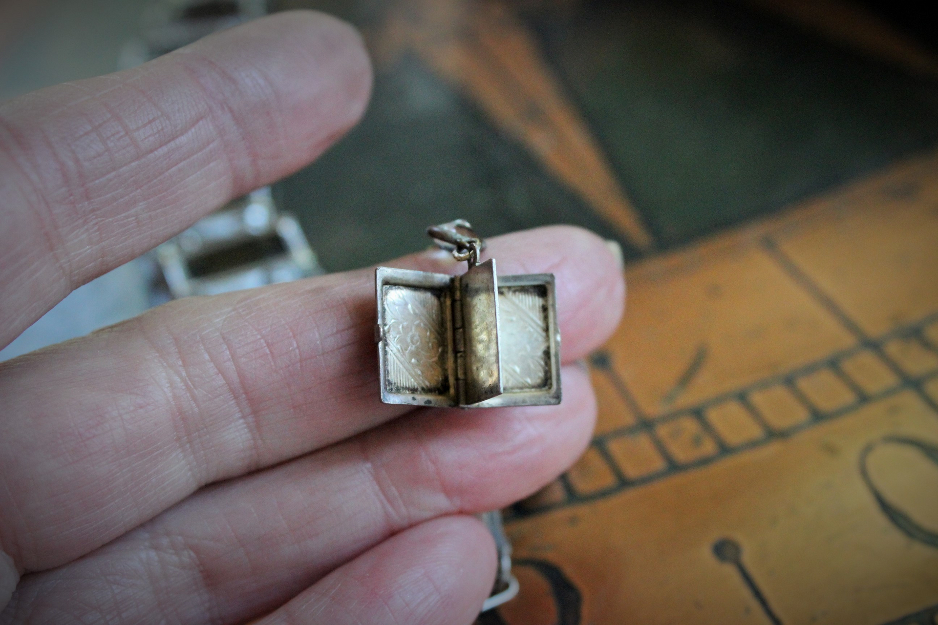 SOLD to C Exquisite Vintage 1950's Japan Emerald Cut Step Faceted Rock Crystal Bracelet w/Rare Antique 16th Century St. Stanislaus Relic,Antique Sterling Engraved Puffy Heart and Photo Locket + More!