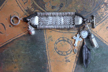 How to Fly Bracelet with Old Sterling Cuff, Sterling Cross, Raven Wing,Glass Quote Vessel & Sterling Capped Bead